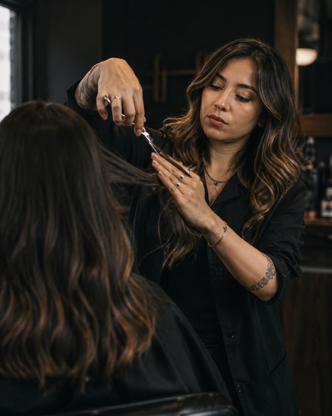 Portrait of Nina Castellanos, scissor specialist at Halftone, mid-cut