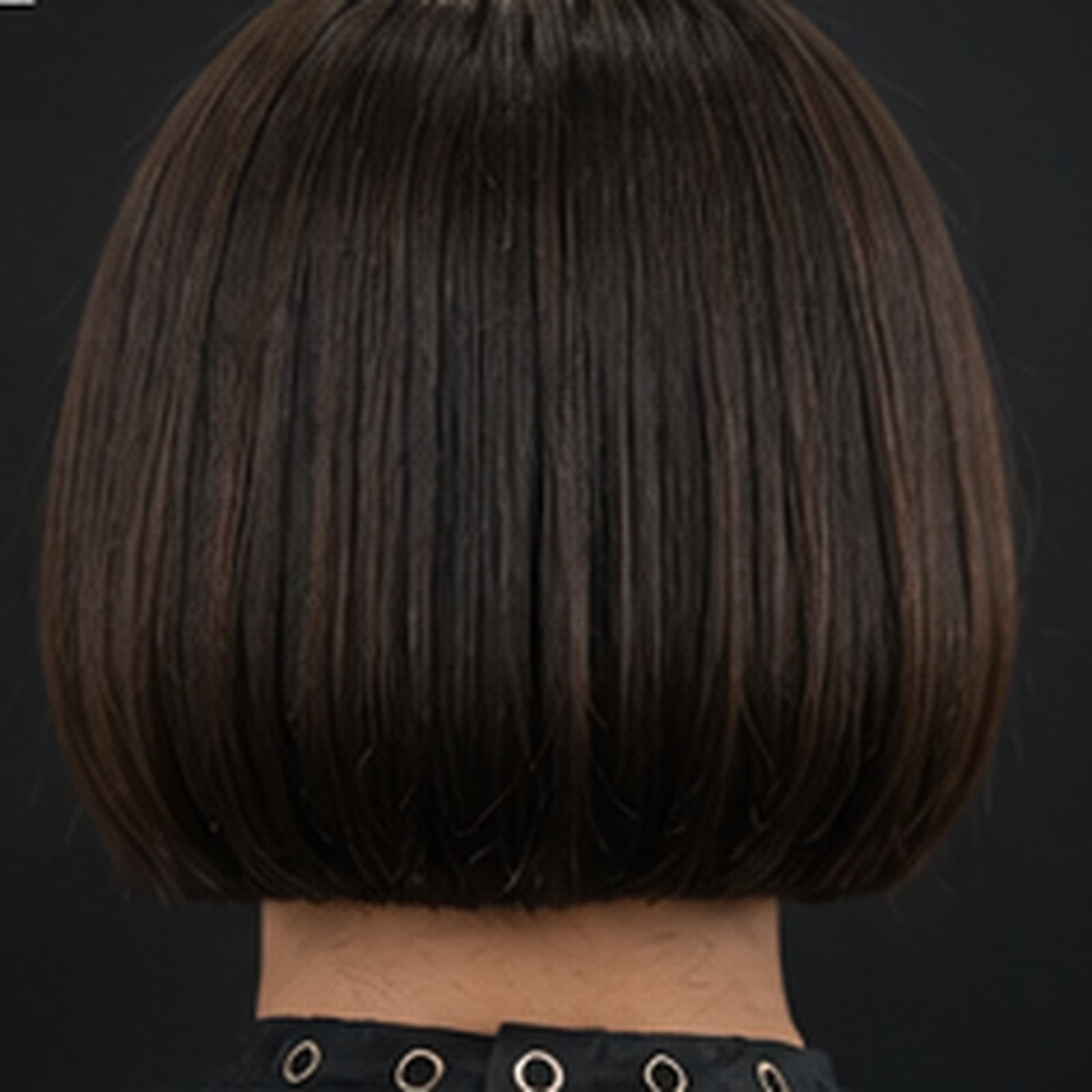 Blunt jaw-length bob cut with scissors over comb, shot from behind